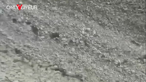 Beach Voyeur. Hot babe the beach totally naked and with buttplug in her ass